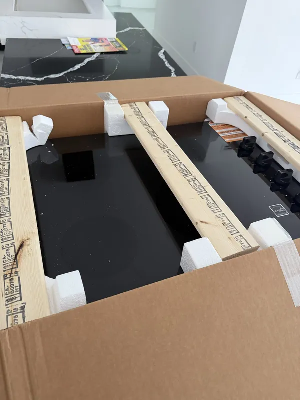 New cooktop in its shipping packaging