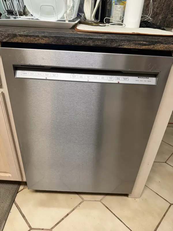 Stainless steel dishwasher under the kitchen counter