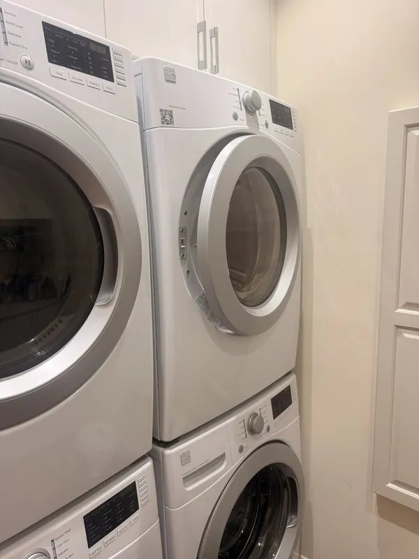 Stacked washer and dryer in the laundry room