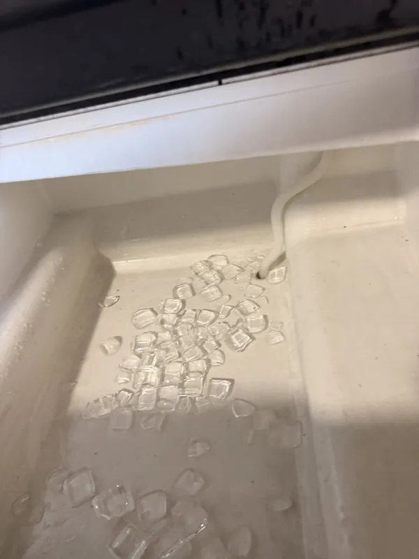 Ice cubes in the ice machine bin