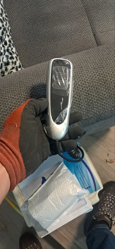 New lift chair hand control in its plastic wrap