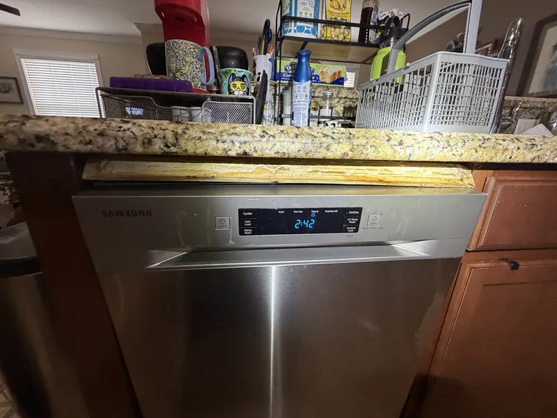 Dishwasher under a granite countertop