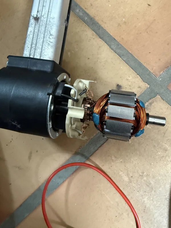 Recliner actuator motor taken apart, armature and brushes out