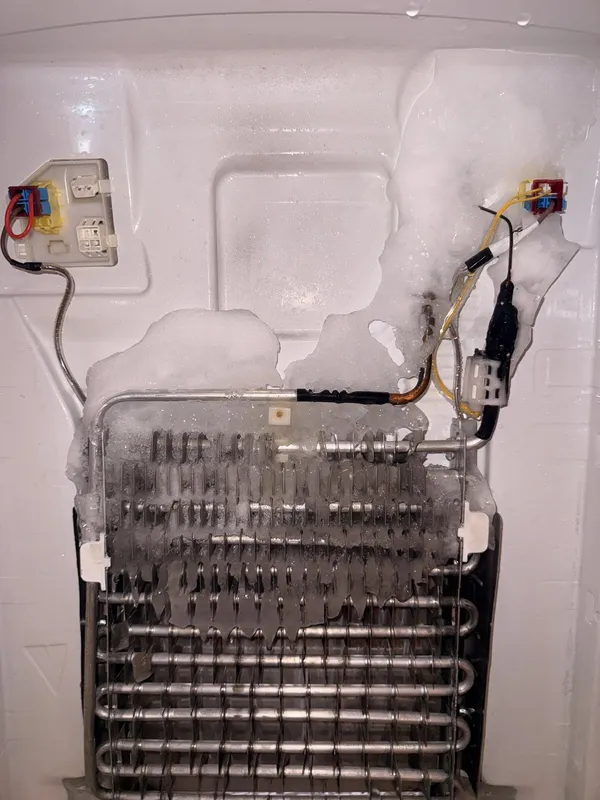 Frozen evaporator coils with ice buildup