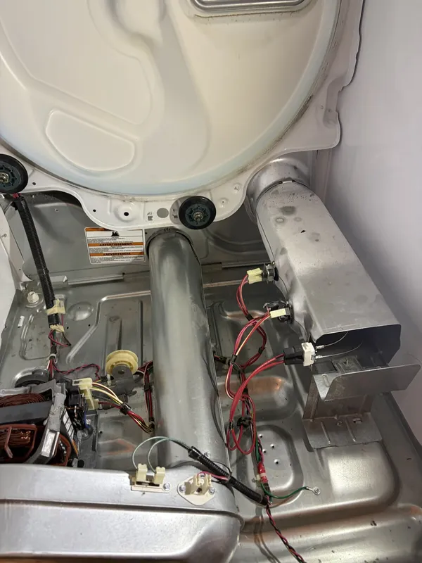 Heating element housing, motor and wiring inside the dryer